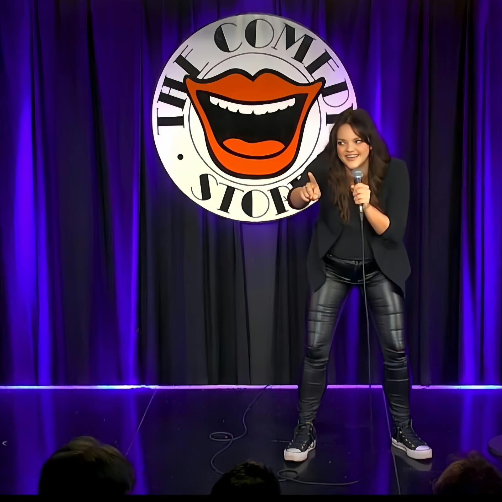 Kirsty Hulse performing stand-up at The Comedy Store