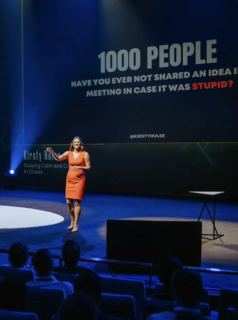 Kirsty Hulse on stage in front of a large audience